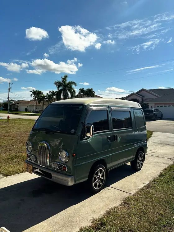 Mint green Subaru Sambar kei van detailed for a car show